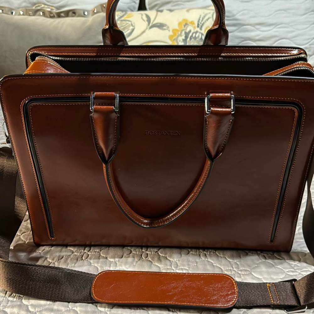 Bostanten brief case with 3 compartments, one for computer. 16 in long, 11 tall